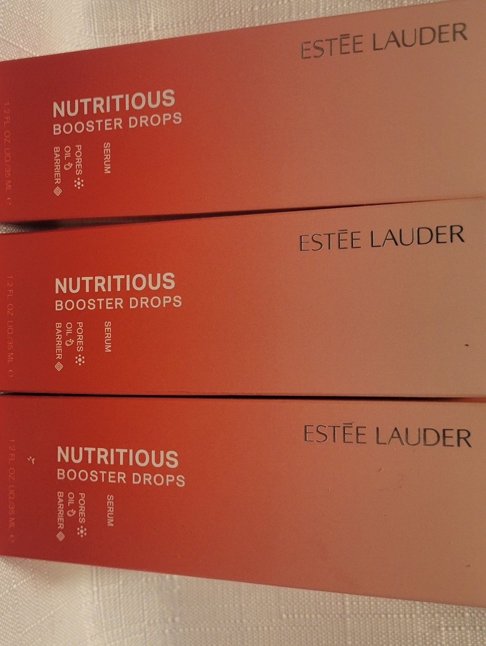 Estée Lauder Nutritious Booster Drops - Peach Coral Packaging